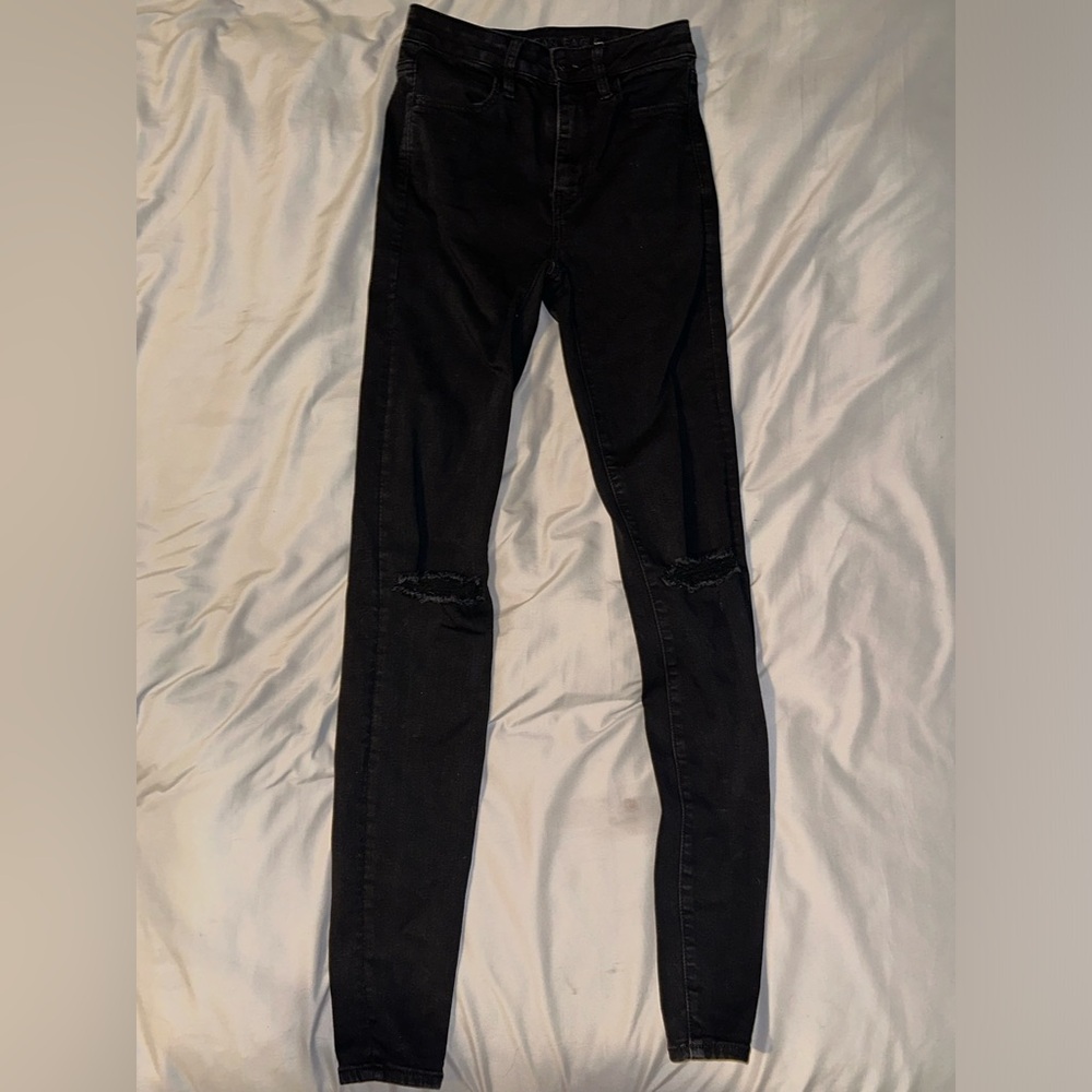 Black American Eagle jeans.